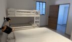 Lits superposés et lit double de la chambre familiale