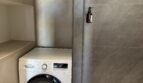 Lave-linge dans la salle de bain